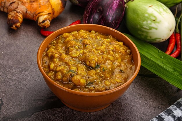 Indian cuisine Dal Tadka soup with lentil and peas