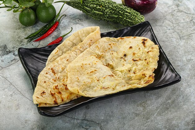 Indian cuisine tandori bread naan with cheese