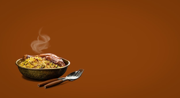 Indian dish biryani chicken with basmati rice with steam