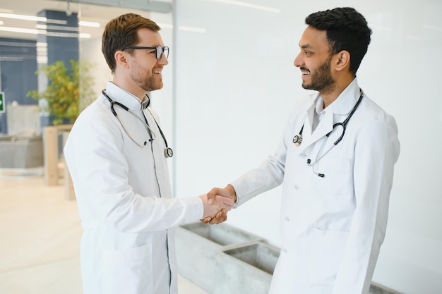 An Indian doctor with a European doctor colleague Multiracial team concept