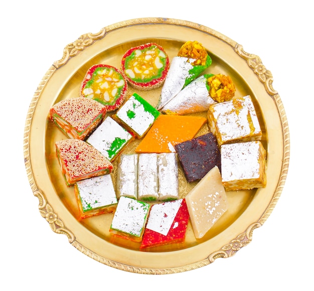 Photo indian dry fruits sweets on white background