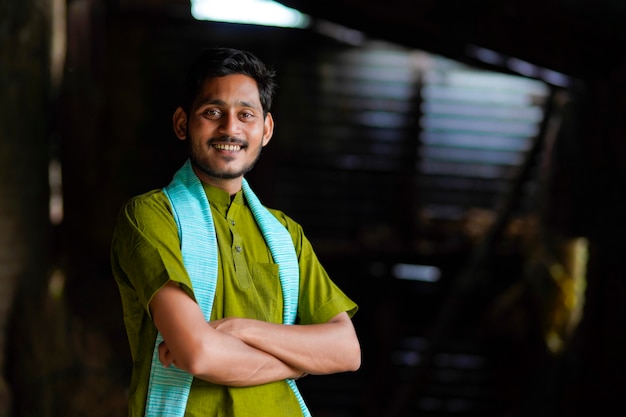 Indian farmer in traditional wear at home.