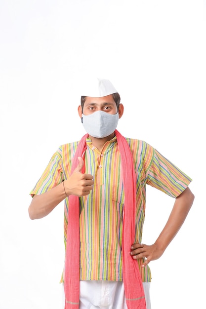 Indian farmer were a medical mask against protect from virus