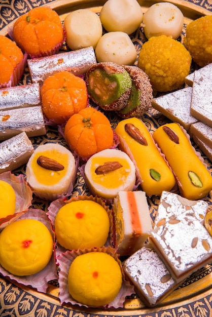 indian festival assorted sweet food or mithai on white background