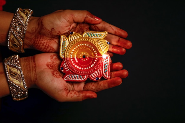 Indian Festival Diwali, lamp in hand