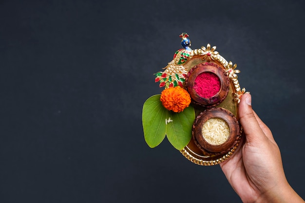 Indian festival Dussehra, green apta leaf in hand