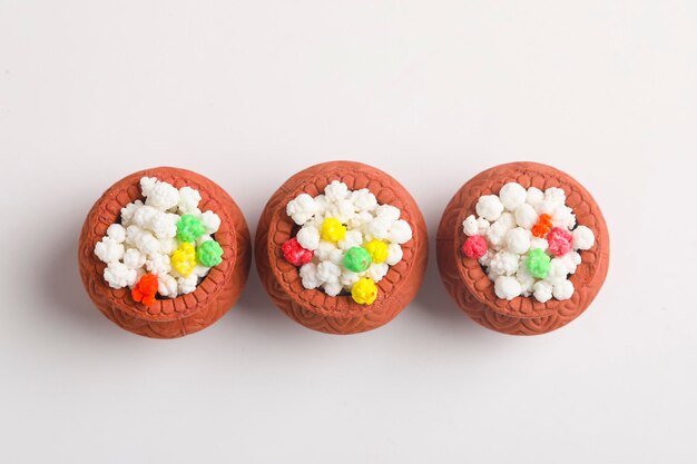 indian festival makar sankranti concept : tilgul in small bowl. tilgul is a colourful sesame candy coated with sesame seeds; in maharashtra people exchange tilgul on sankranti