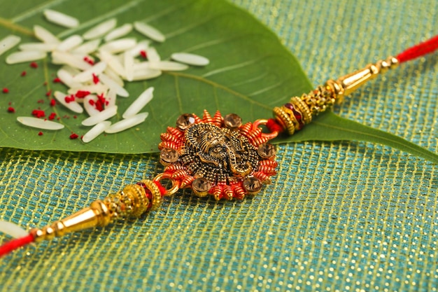 Indian festival raksha bandhan a traditional indian wrist band\
which is a symbol of love between brothers and sisters