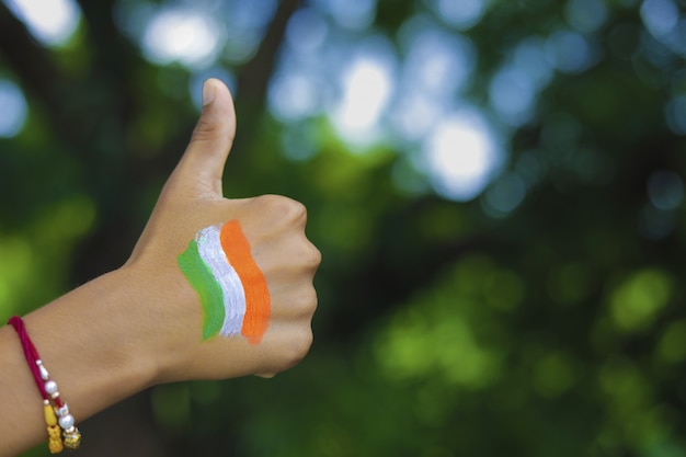 Indian flag on hand and wrist of child