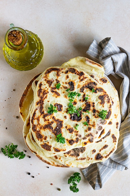 Indian flatbread with parsley and olive oil