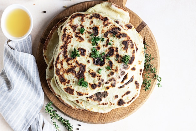 Indian flatbread with parsley and olive oil