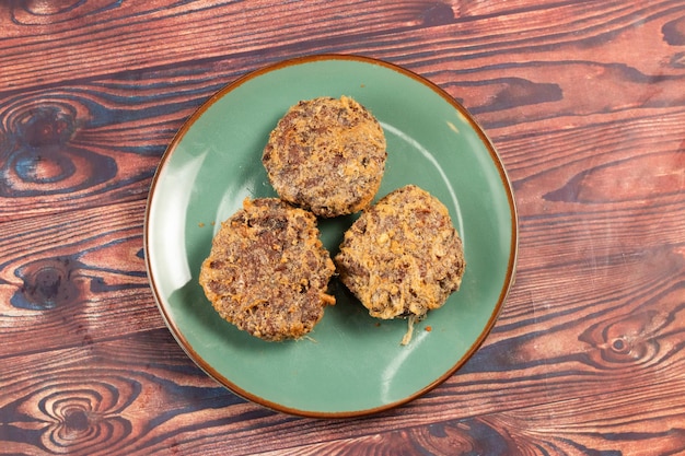 Indian food Jali kabab with tomato sauce served in a dish isolated on background top view