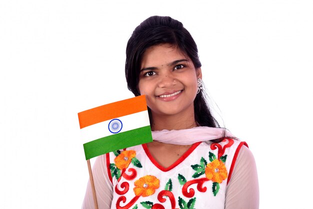 Indian girl standing with Indian flag or tricolor on white background, girl holding Indian flag, Indian Independence day, Indian Republic day