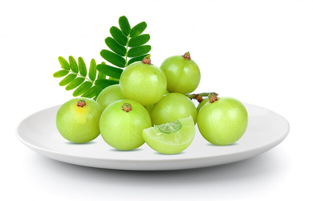 Indian gooseberry in aplate isolated