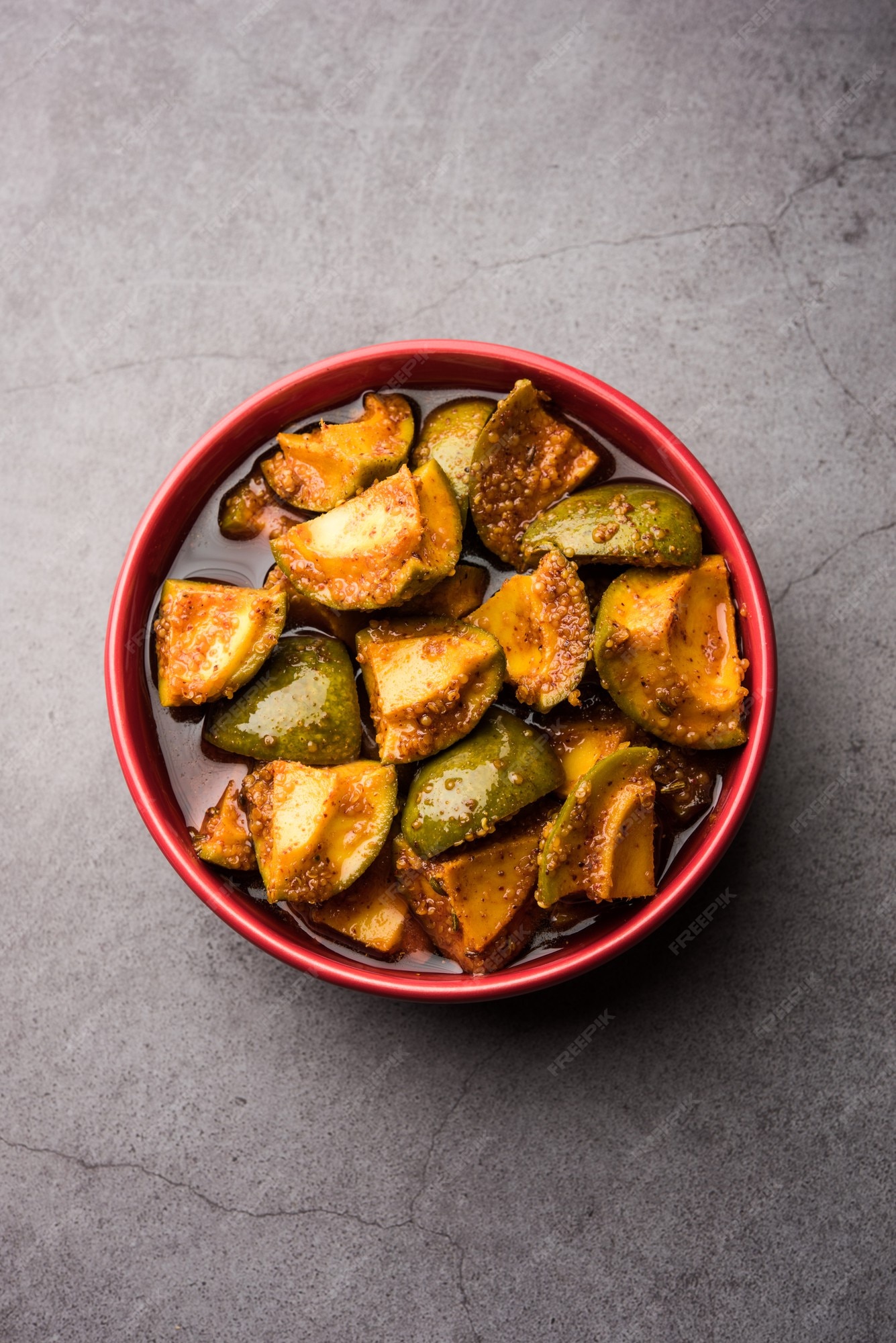 Premium Photo | Indian homemade raw mango pickle or aam ka achar or kairi loncha in a bowl Premium Photo | Indian homemade raw mango pickle or aam ka achar or kairi loncha in a bowl