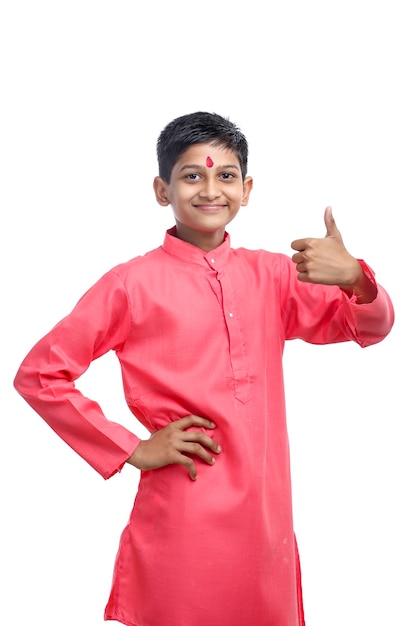 Indian little child in traditional wear on white background.