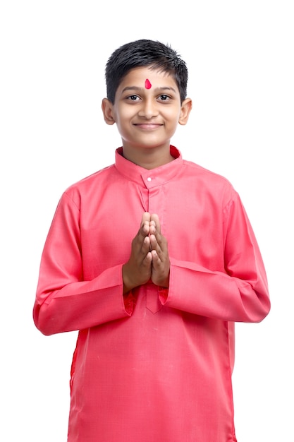 Photo indian little child in traditional wear on white background.