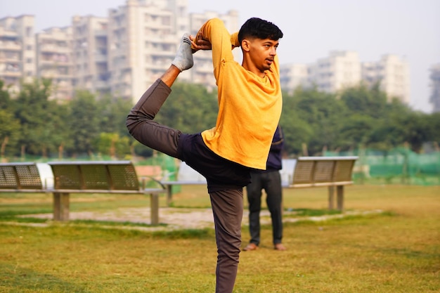 Indian man doing yoga outdoor