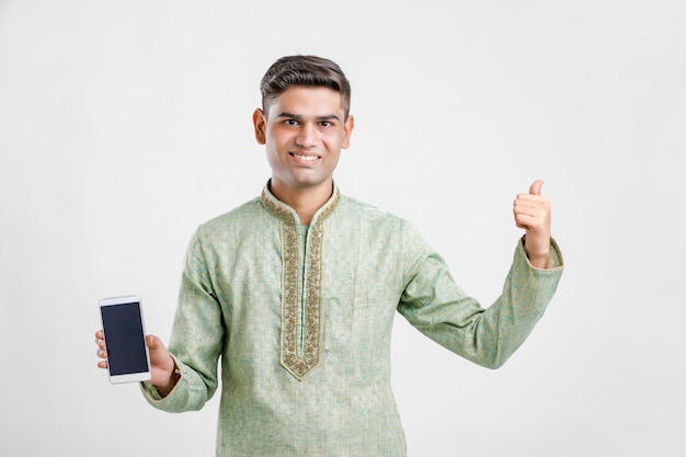 Indian man in ethnic wear and showing smartphone