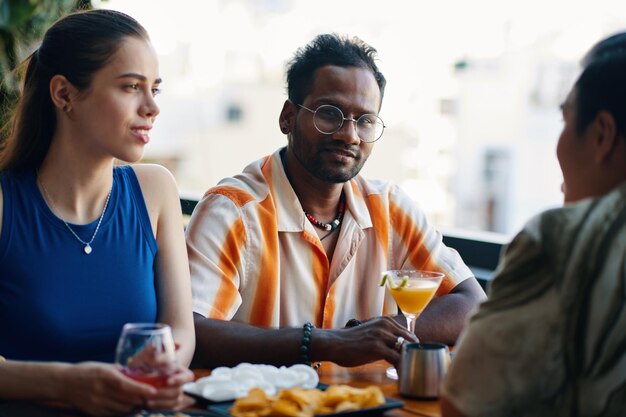 Indian man hanging out with friends