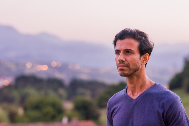 Indian man portrait outdoors on vacation Looking and thinking in future adult confident people