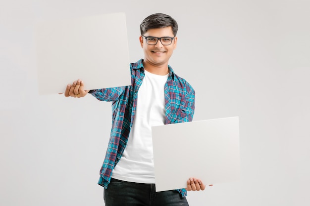  Indian man showing blank signboards