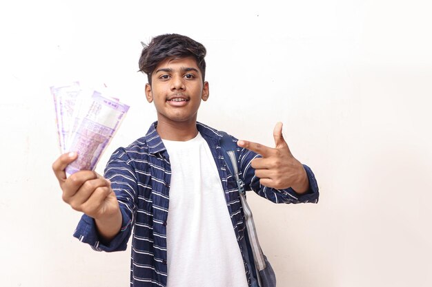 Indian man showing indian currency note