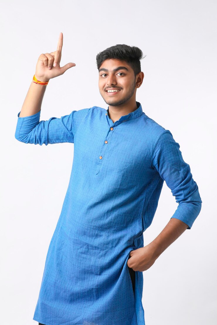 फोटो indian man in tradition wear and giving expression on white background.