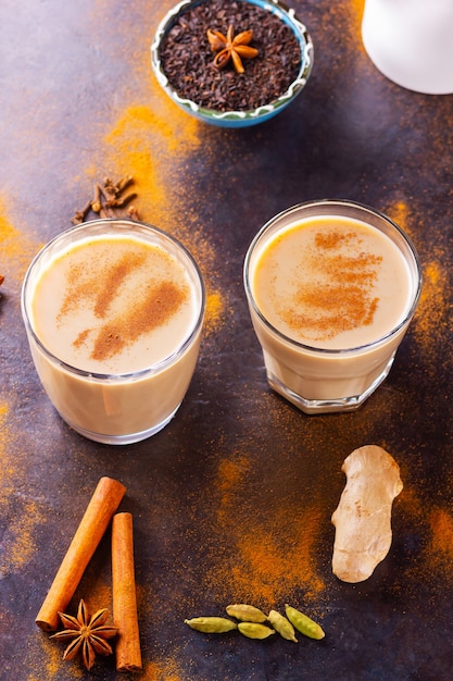 Indian masala chai tea with spices in cups