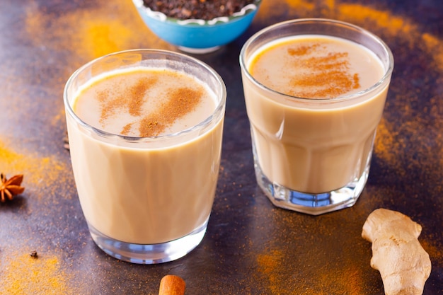 Indian Masala chai tea with spices in cups