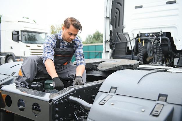 Indian Mechanic repairing the truck