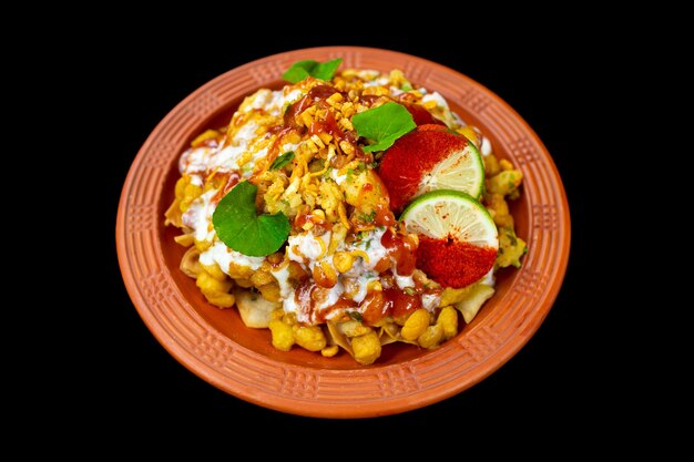 Photo indian nepali bengali dish mixed savory snacks chanachur and mixed namkeen in a mud plate