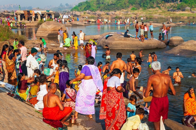 Indian people bathing and washing