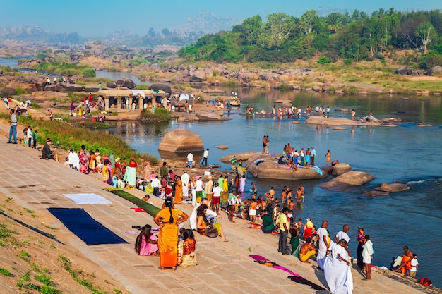 Indian people bathing and washing