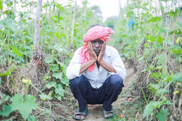 Indian poor farmer in farm sad farmer loss of farmer