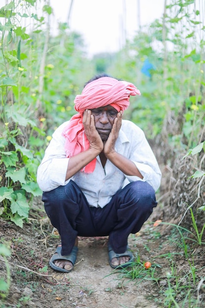 Indian poor farmer in farm sad farmer loss of farmer