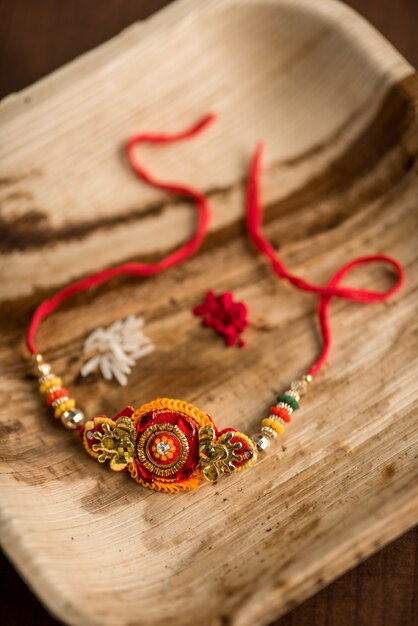 Indian Raksha Bandhan wrist band on a table