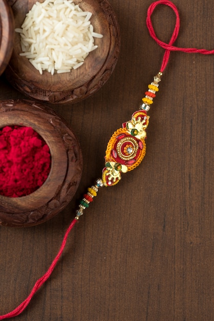 Indian Raksha Bandhan wrist band on a table