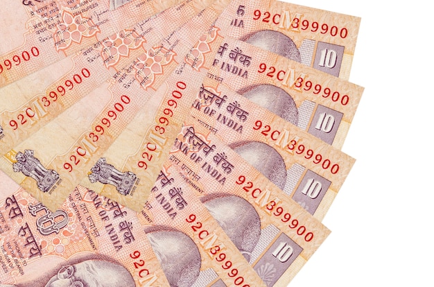 Фото Счета индийских рупий, лежащие на белой поверхности