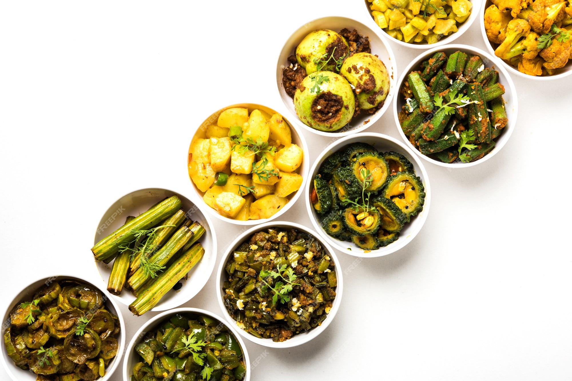 Premium Photo | Indian sabzi, vegetable fried recipes served in white ...