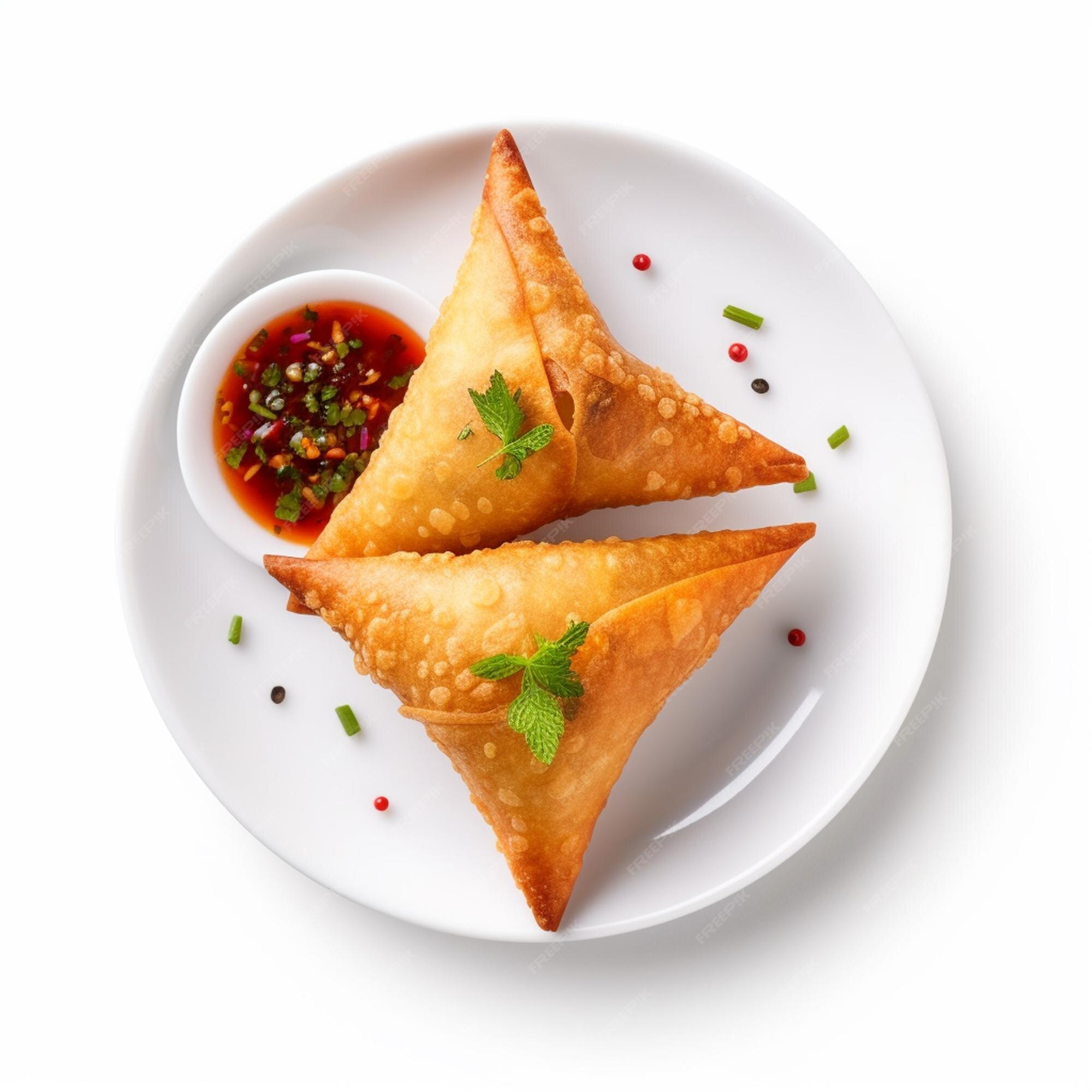 Premium Photo | Indian samosa in white plate with chutney Indian snacks