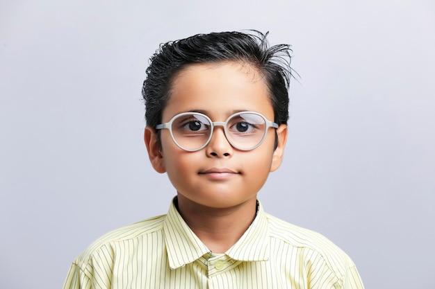 Indian school boy in uniform and giving expression