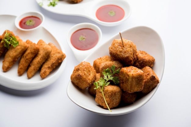 Indian snacks Crispy potato Triangles, Paneer Lollipop and Noodles pakoda in group