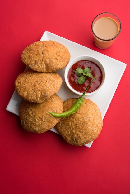 Indian special traditional matar or green peas Kachori served with tomato sauce and hot tea