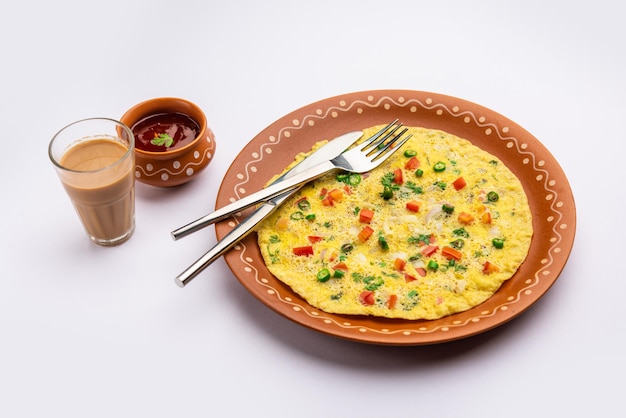 Indian Spiced Masala Omelet filled with fresh vegetable healthy meal