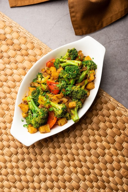 Indian style broccoli and aloo poriyal or south indian broccoli\
and potato stir fry vegetable recipe