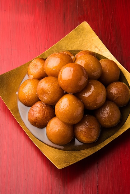 Indian sweet food gulab jamun, a popular wedding or festival dessert. selective focus