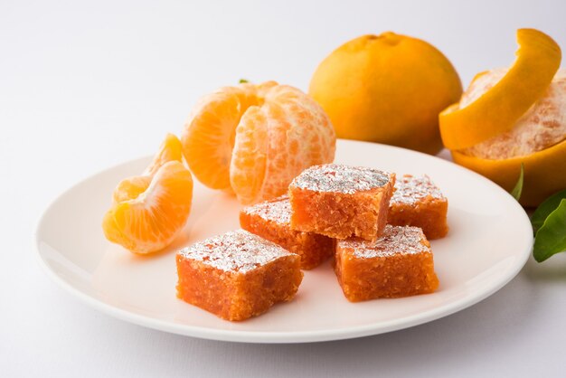 Indian sweet food Orange Burfi or orange cake or santra burfi in hindi, favourite festival food from central india