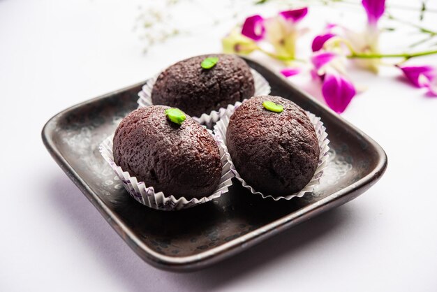 Indian Sweet Food Sweet Black Gulab Jamun Also Known as Kala Jamun Black Jamun or Dry Kala Jam