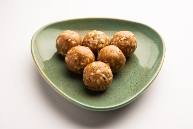 Indian sweet groundnut ladoo or mungfali or peanut laddo or laddu made using roasted peanuts and jaggery